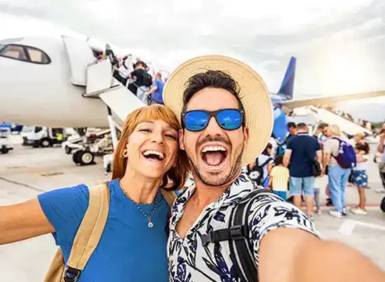 Happy travelers at airport